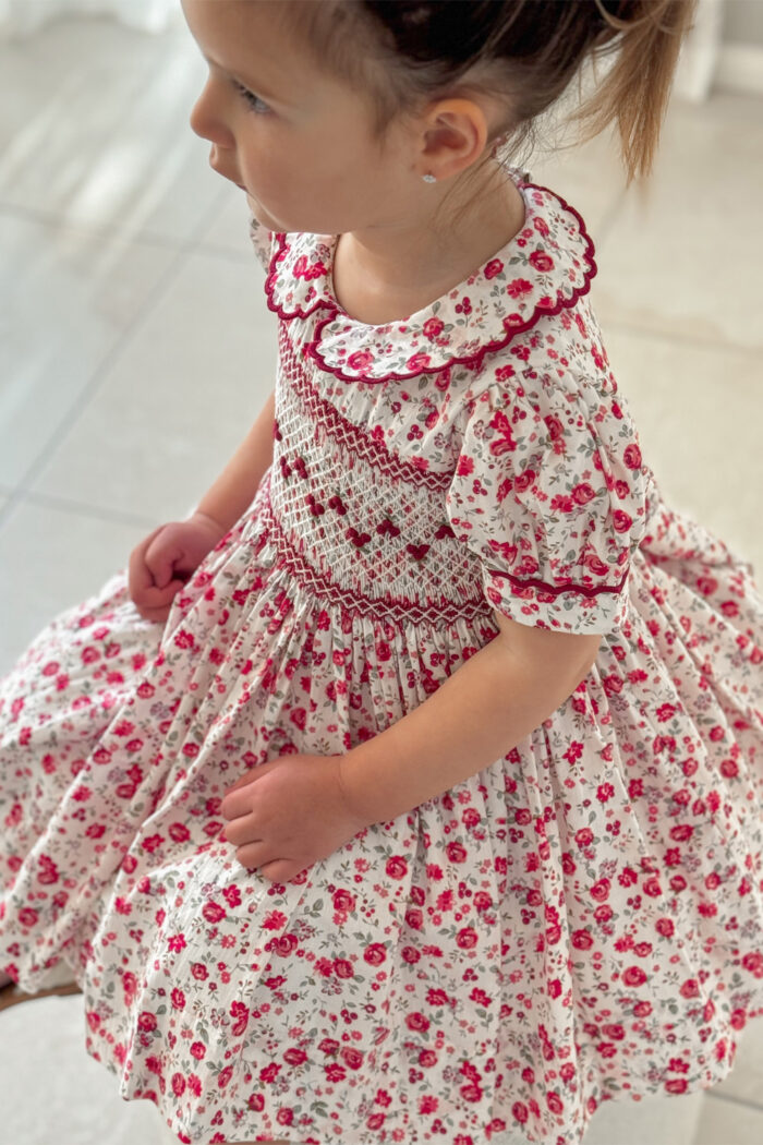 DR4463 – Girls’ Hand-Smocked Floral Dress with Embroidered Hem & Ruffled Collar
